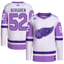 Youth Adidas Detroit Red Wings Jonatan Berggren White/Purple Hockey Fights Cancer Primegreen Jersey - Authentic